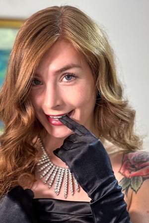 Katie Cooper nude photo 02 - Katie Cooper Black Robe And Stockings Stripping On The Bed